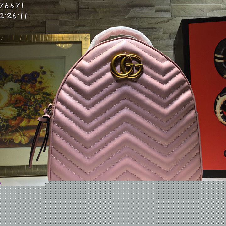 G*u*i backpacks